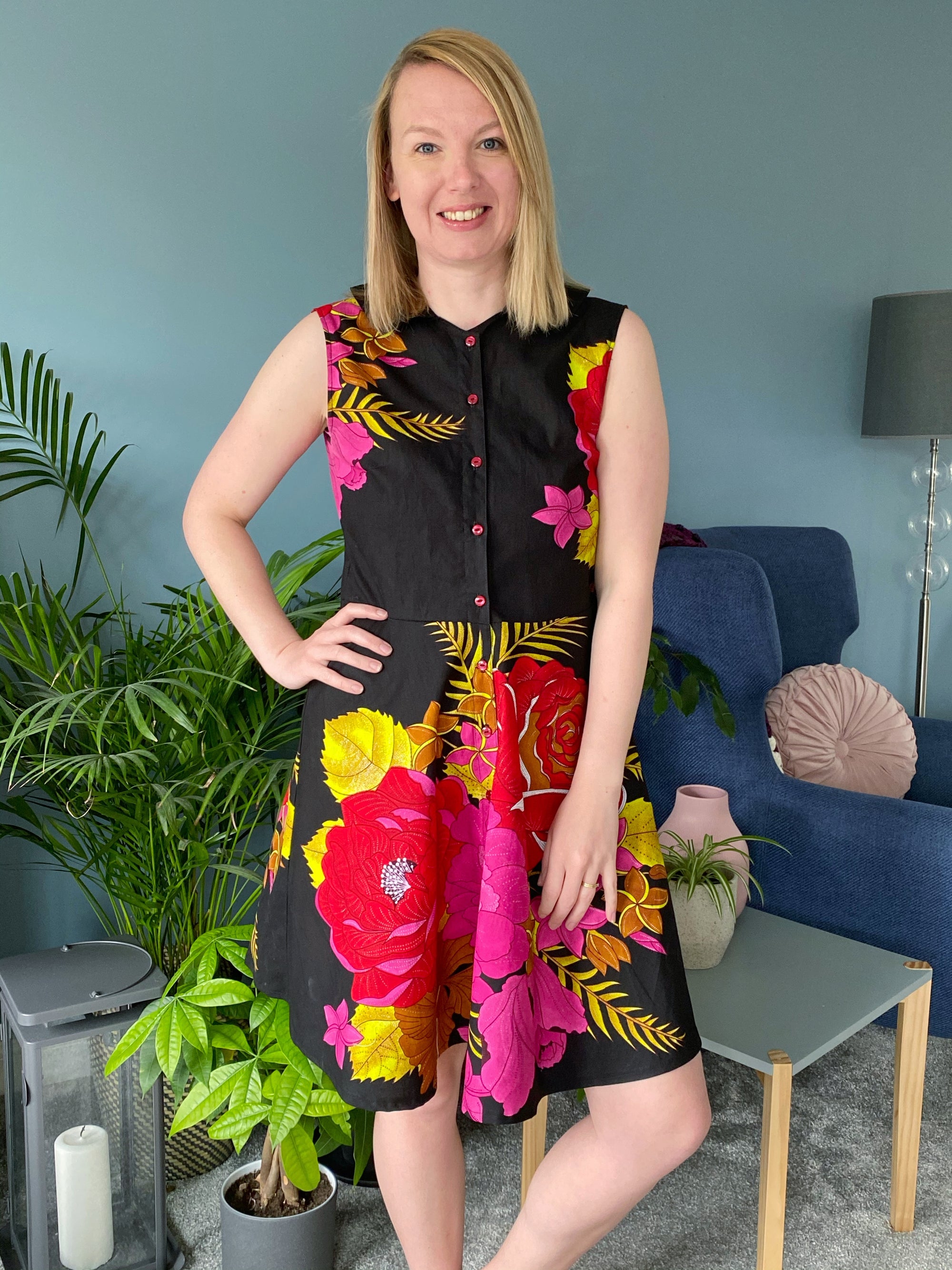 Adelle wearing the 'Etta' dress crafted with African print fabric from Dovetailed London, combining fashion and culture seamlessly