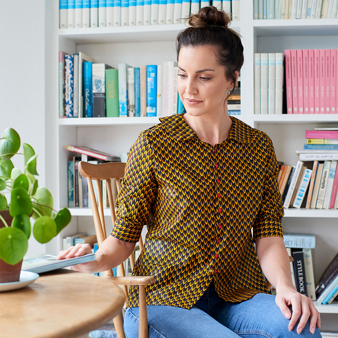 Model wearing the 'Mary' shirt in African wax print fabric from Dovetailed London.