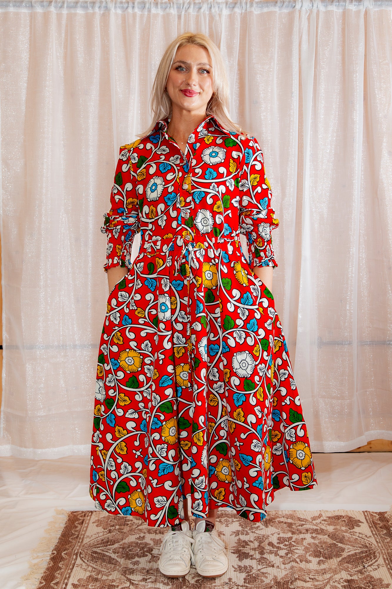 A model posing in Onyeka African Print Shirt Dress in Red Ankara Dress Clothes collection