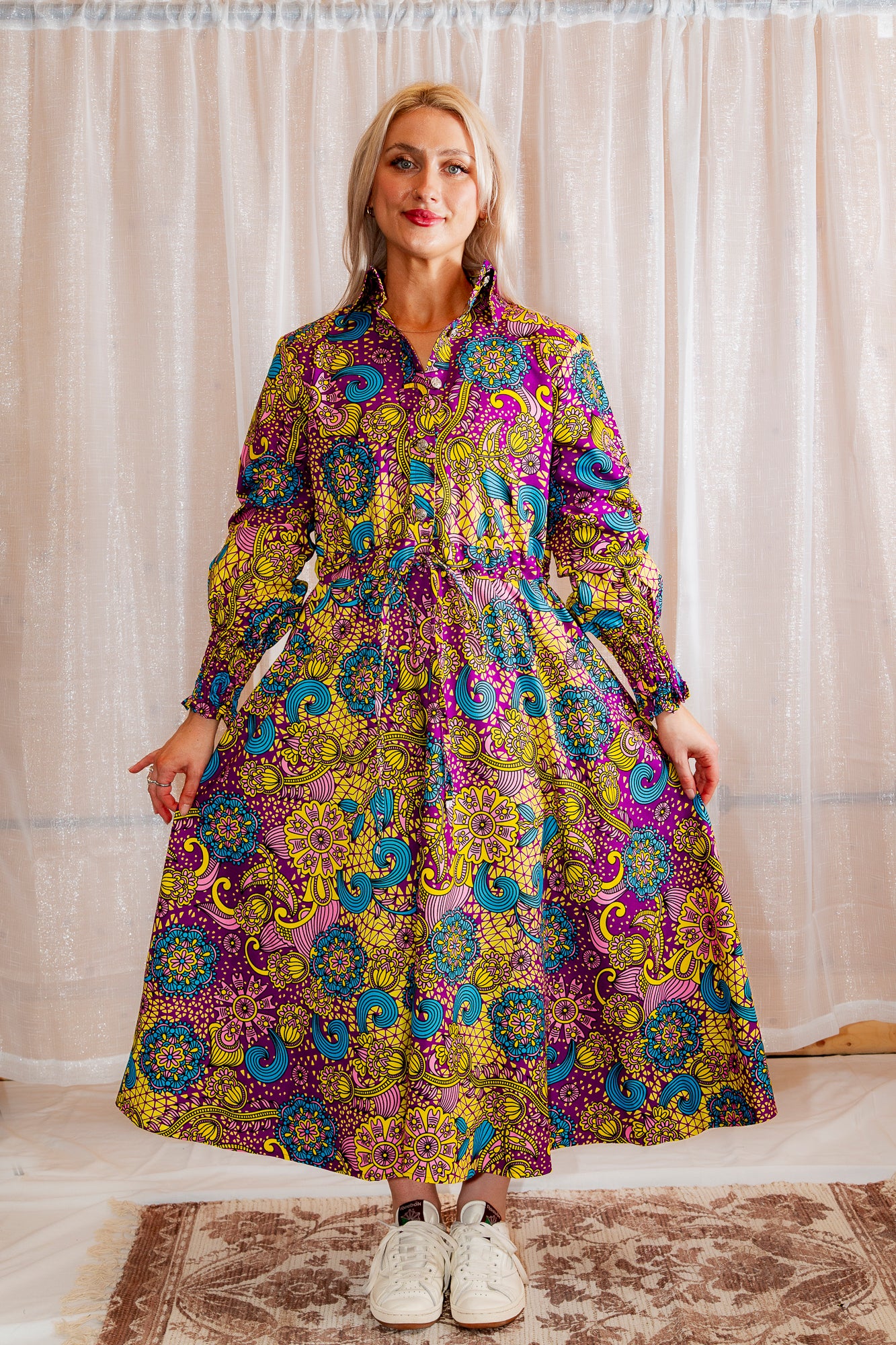 Model posing in Onyeka African Print Shirt Dress Purple Ankara Dress Clothes