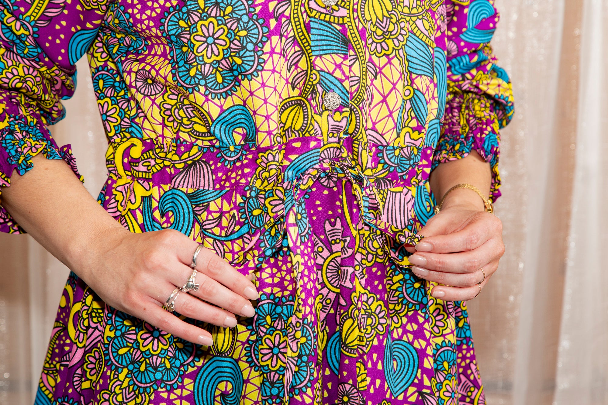 model showing close up of Onyeka African Print Shirt Dress Purple