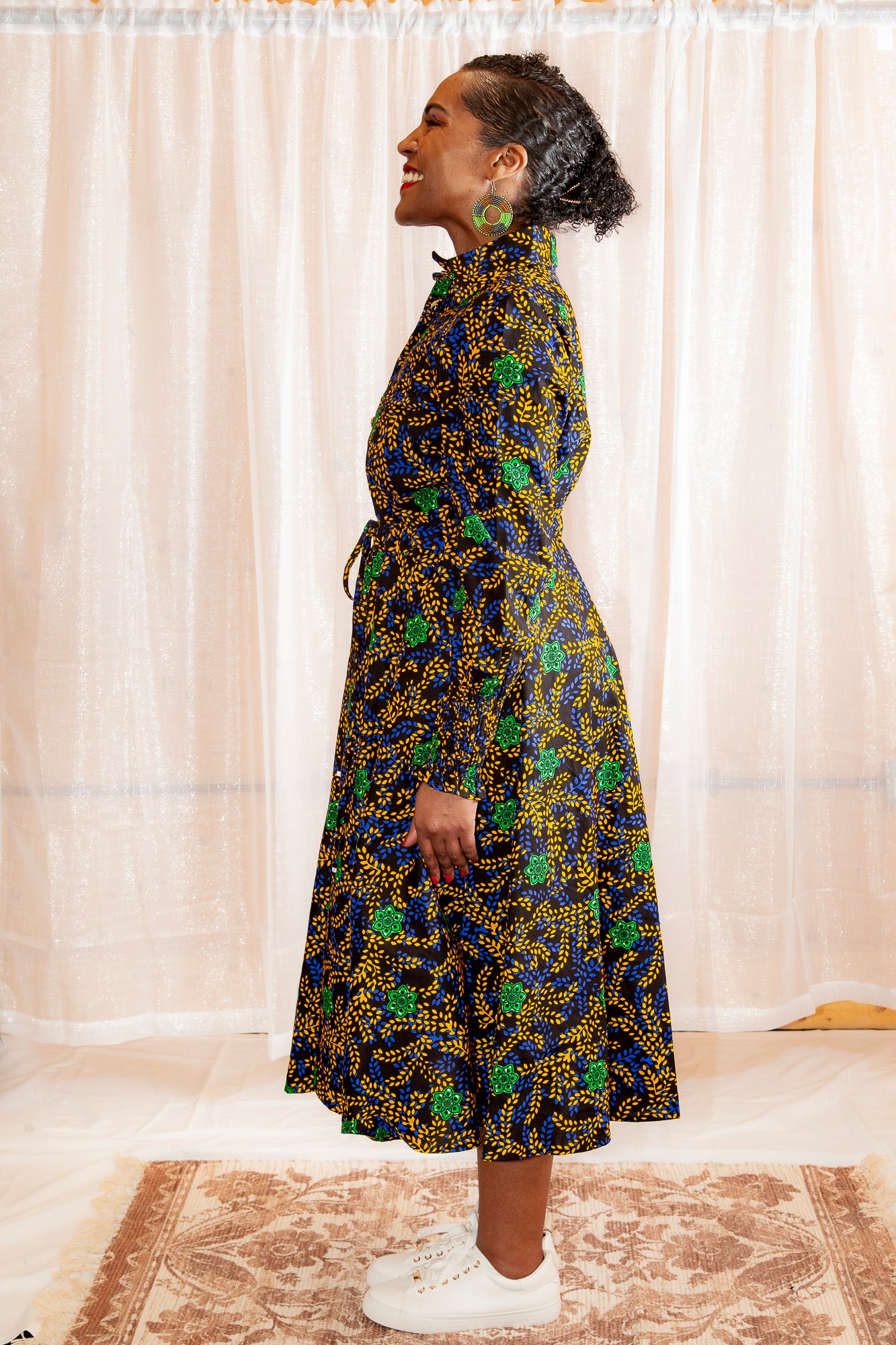 A model posing Onyeka African Print Shirt Dress Black Ankara Dress Clothes