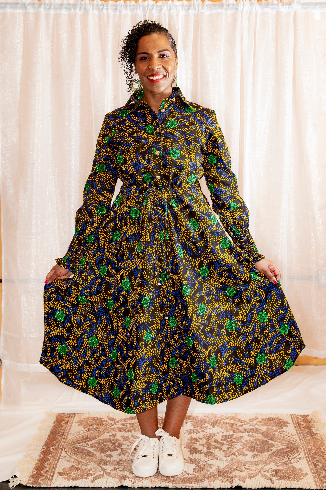 A model posing Onyeka African Print Shirt Dress Black Ankara Dress Clothes