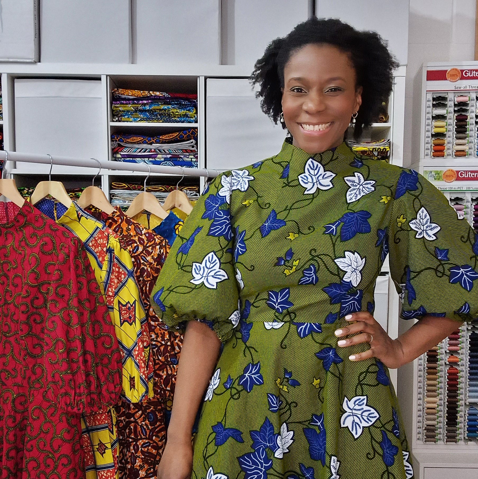 Adaku wearing the 'Camille African Print Puff Sleeve Dress Khaki' in African Wax print by Dovetailed London.