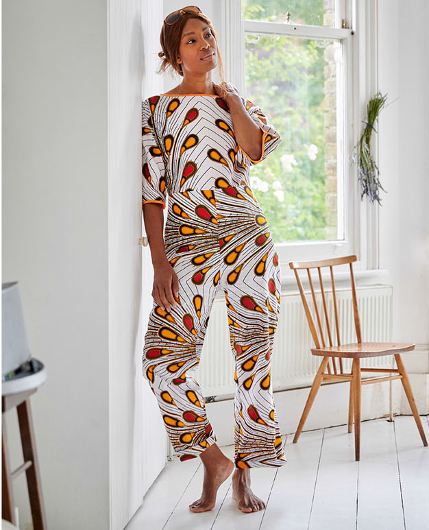Model wearing the 'Jennifer' jumpsuit in African wax print fabric from Dovetailed London.