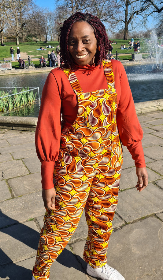 Lena wearing 'Yanta' overalls by Helen's Closest using African print fabric from the Sable Subscription Box by Dovetailed London.