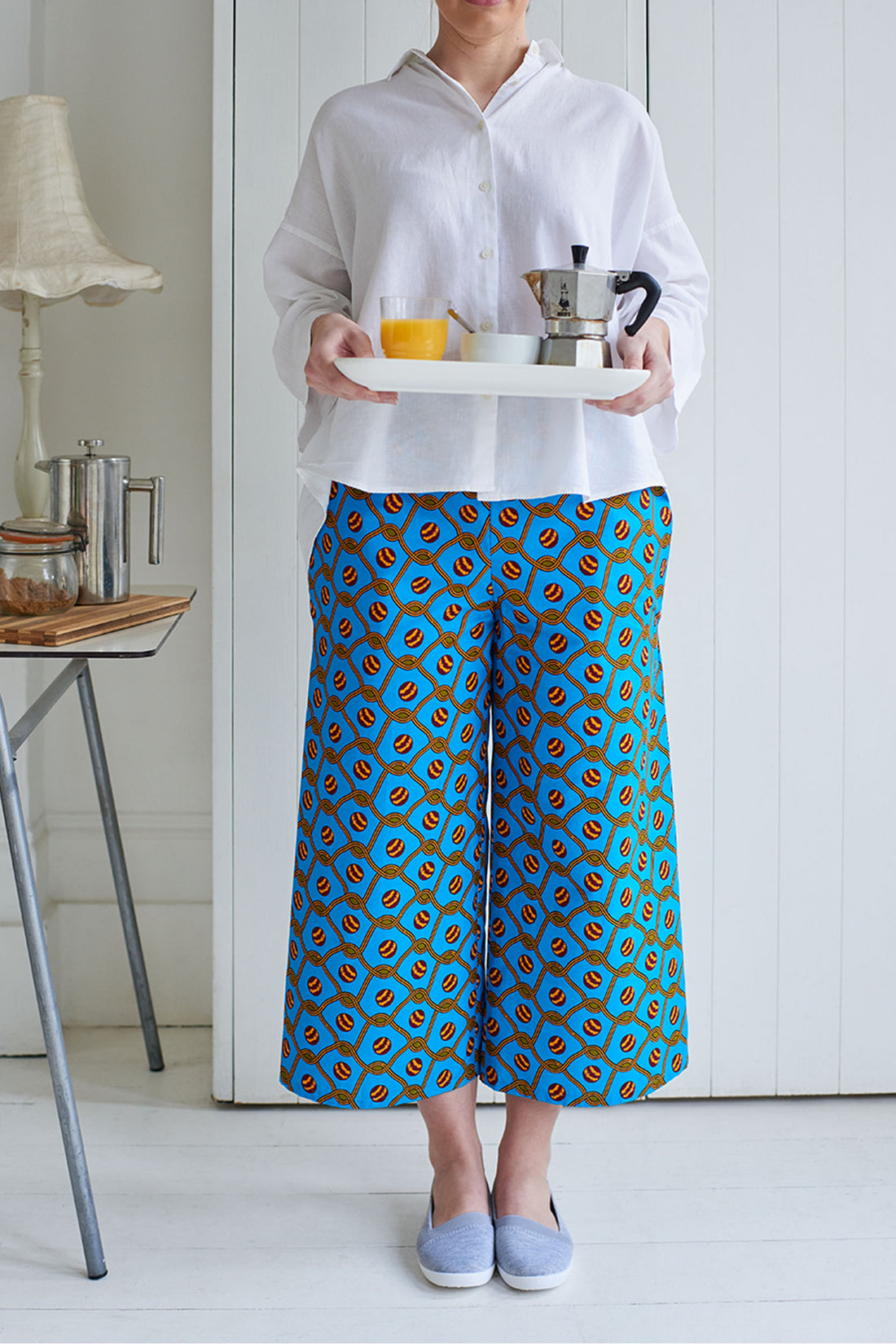 Model wearing the 'Lottie ' Culottes in African wax print fabric from Dovetailed London.