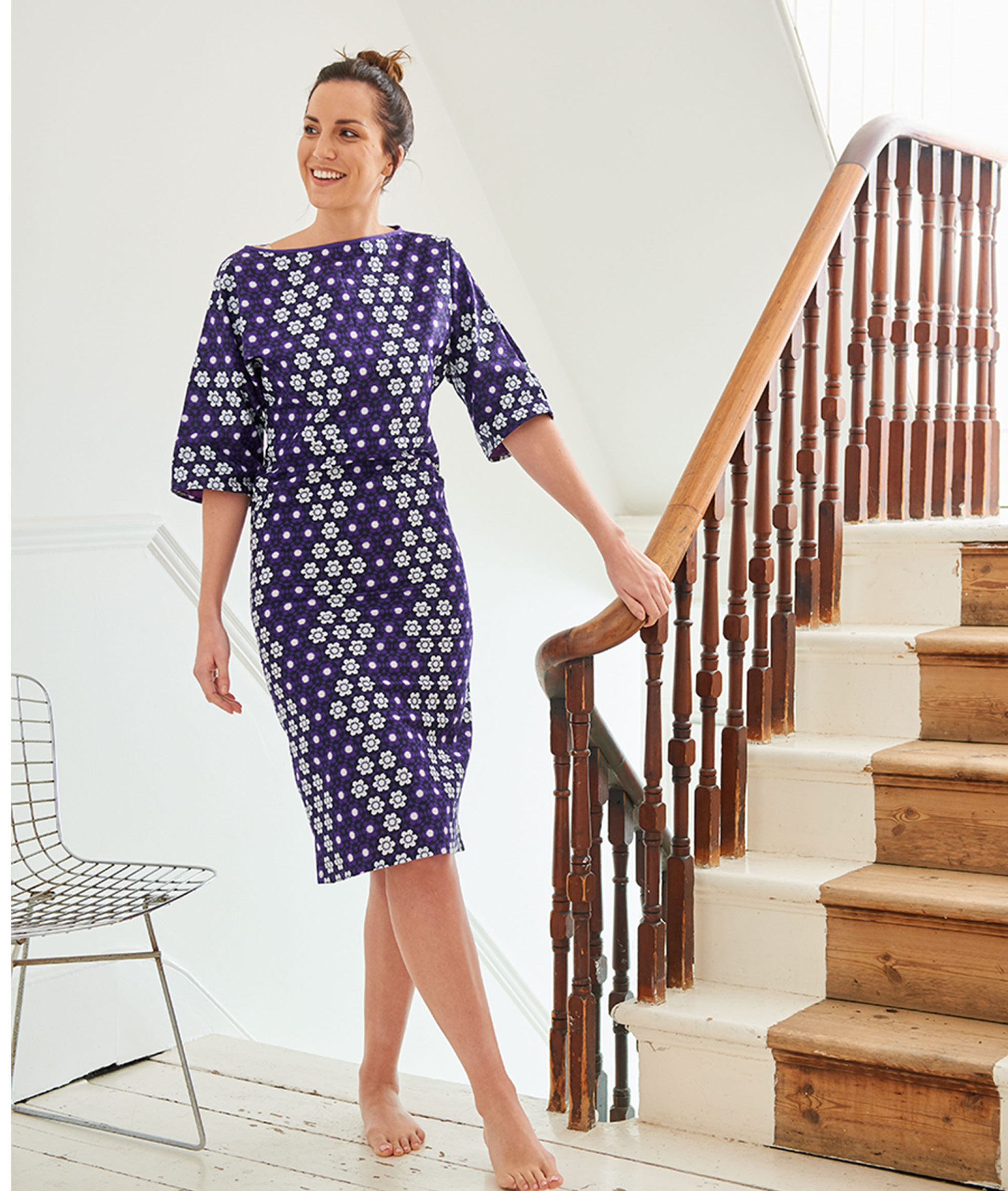 Model wearing the Millie' dress in African wax print fabric from Dovetailed London.