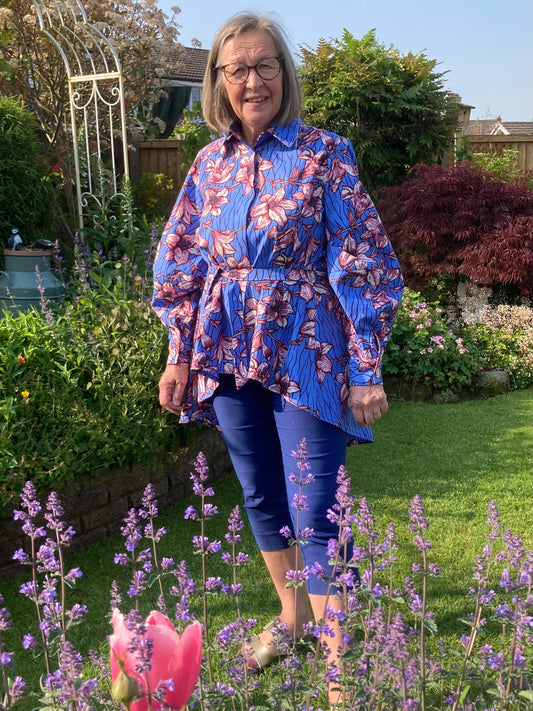 Angela showcasing style and confidence in the striking Vogue 1786 shirt made from the 'AFRICAN PRINT-0193’' African print wax fabric from Dovetailed London, embracing bold patterns and contemporary fashion.