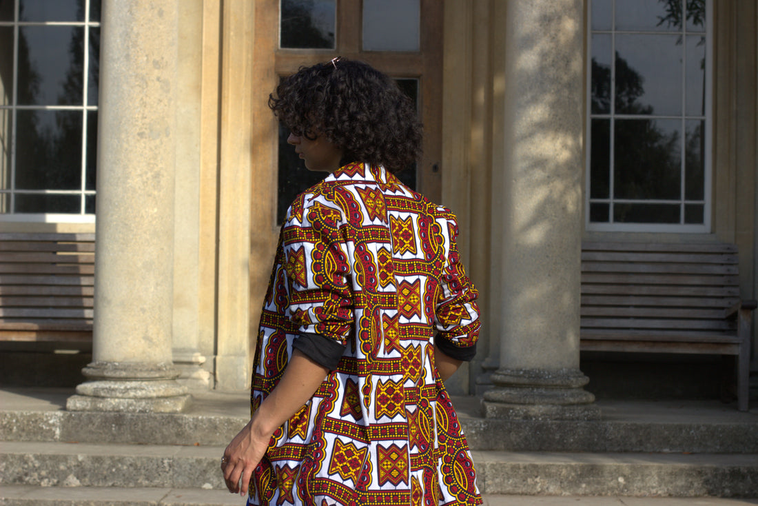 Model wearing the Heather blazer made from African wax print fabric by dovetailed london