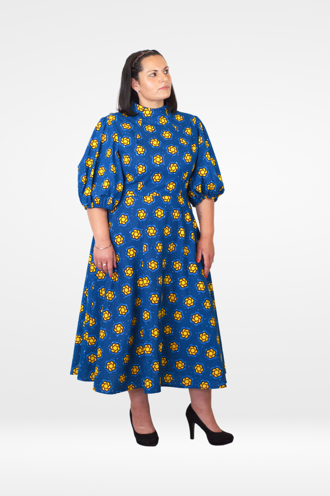 Model posing in Camille African Print Puff Sleeve Midi Dress Blue Ankara Dress Clothes