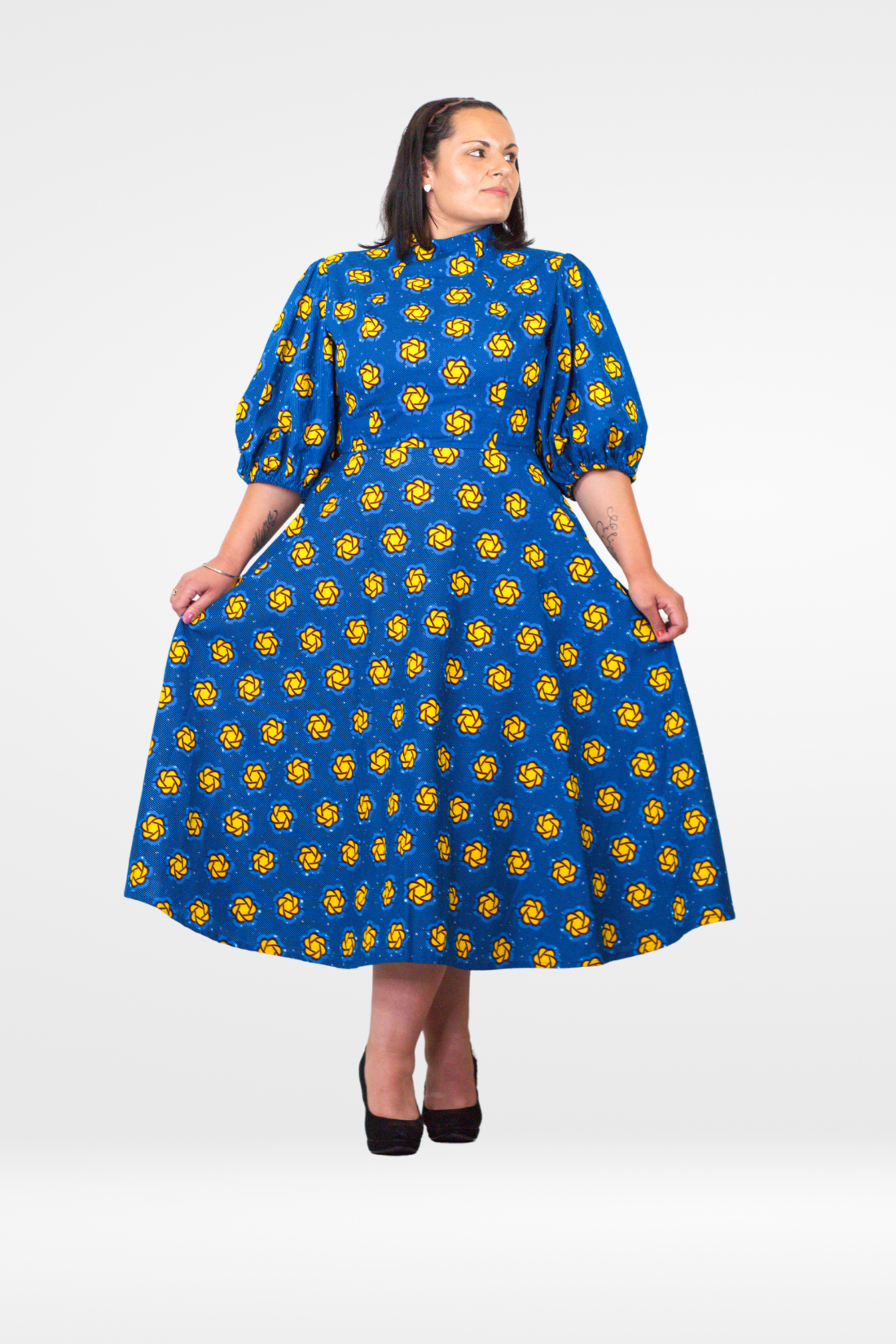 Model posing in Camille African Print Puff Sleeve Midi Dress Blue Ankara Dress Clothes