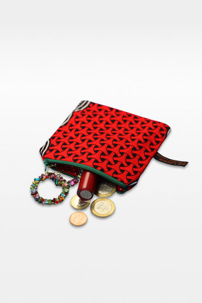 A red and black fabric pouch on a white plain background