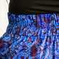Waistline of the botanical blue print skirt, showcasing the elasticity of the belt area.