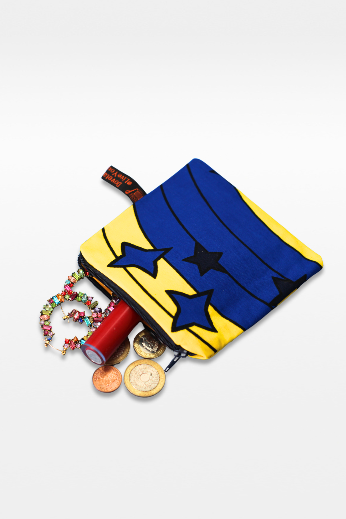 A blue and yellow pouch with blue stars on a white plain background