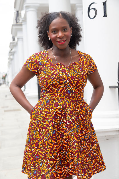 The Ultimate Oma African Print Scallop neckline Knee-Length Dress Orange Ankara