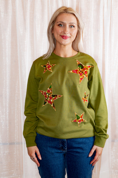 Model posing in African Print Ankara Green Stars Cotton-Blend Sweatshirt.