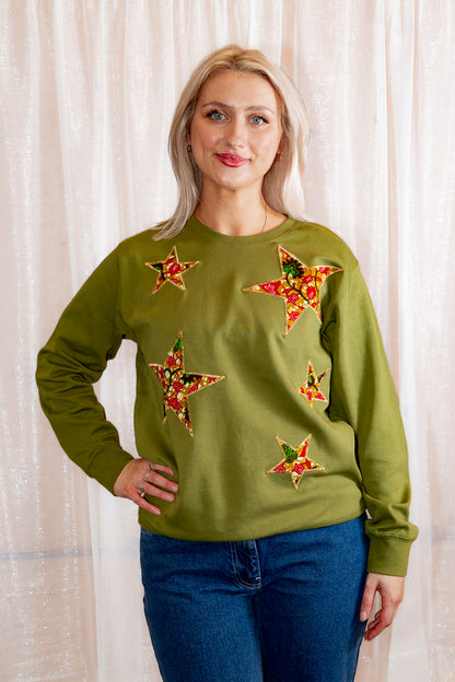 Model posing in African Print Ankara Green Stars Cotton-Blend Sweatshirt.