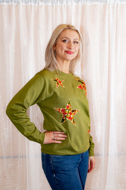 Model posing in African Print Ankara Green Stars Cotton-Blend Sweatshirt.