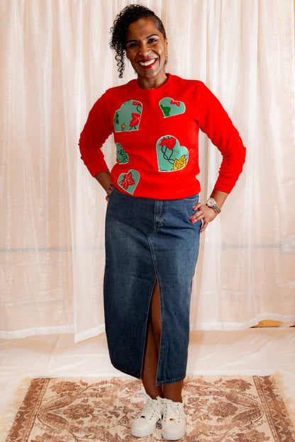 Model posing in African Print Ankara Red Hearts Cotton-Blend Sweatshirt.