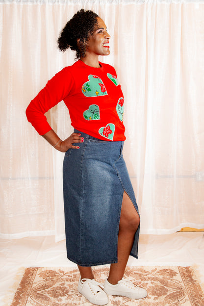 Model posing in African Print Ankara Red Hearts Cotton-Blend Sweatshirt.