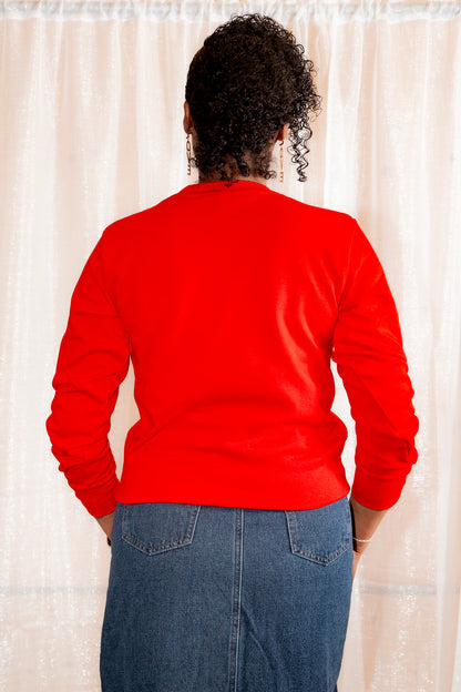 Model posing in African Print Ankara Red Hearts Cotton-Blend Sweatshirt.