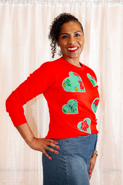 Model posing in African Print Ankara Red Hearts Cotton-Blend Sweatshirt.