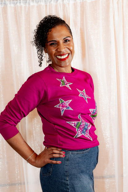 Model posing in African Print Ankara Purple Stars Cotton-Blend Sweatshirt.