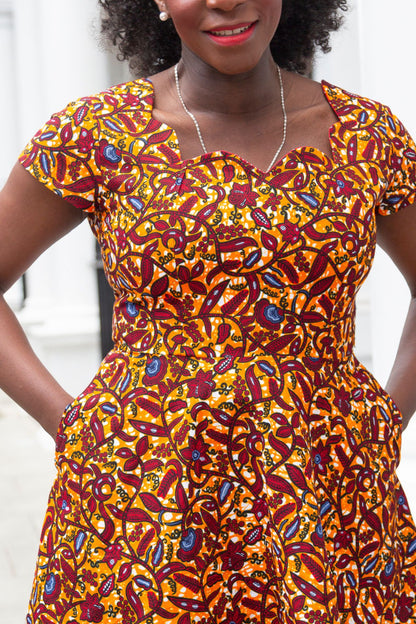 The Ultimate Oma African Print Scallop neckline Knee-Length Dress Orange Ankara